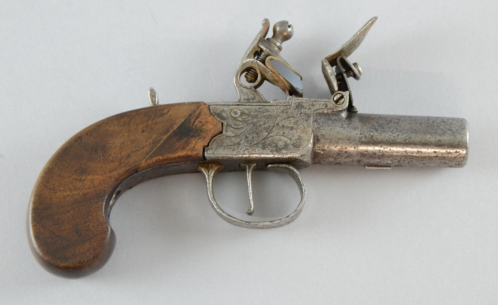 19th century flintlock pistol with steel barrel and mahogany grip, touch marks to barrel,Grip