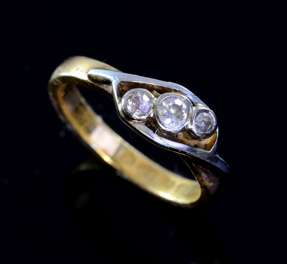 Three stone diamond ring with white and yellow gold stamped 22ctOverall good condition fine