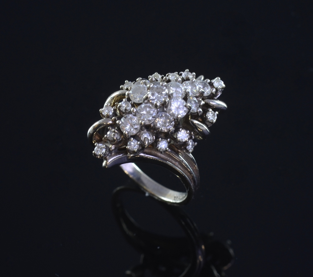 A white gold diamond cluster ring Stamped 14ct, diamond weight 1.26 caratsGood condition