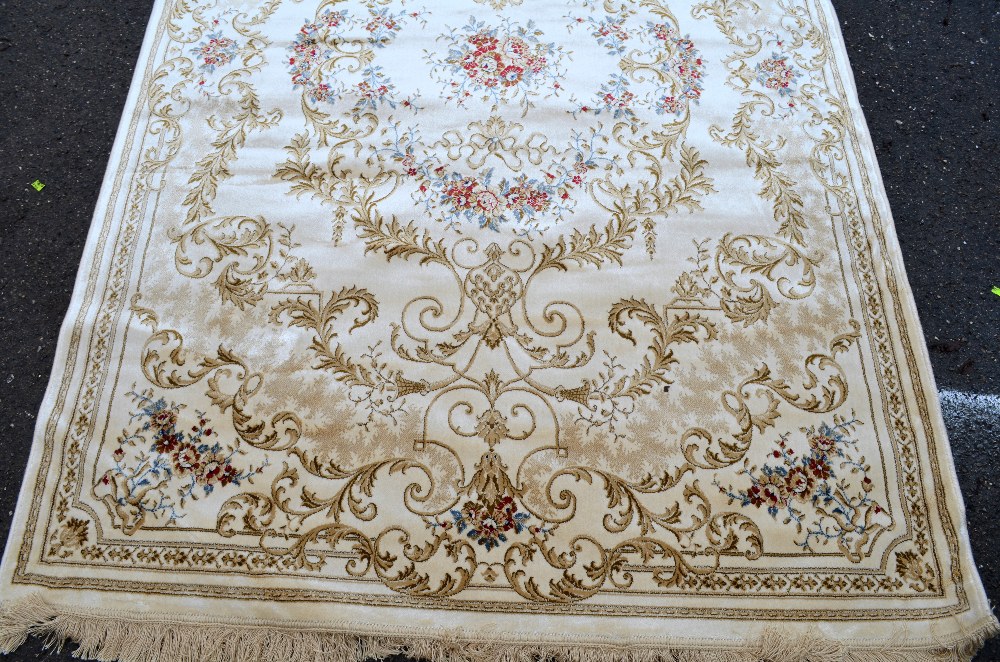 Ivory ground Kashmir rug with a classical floral design, 2.4m x 1.6m - Image 3 of 5