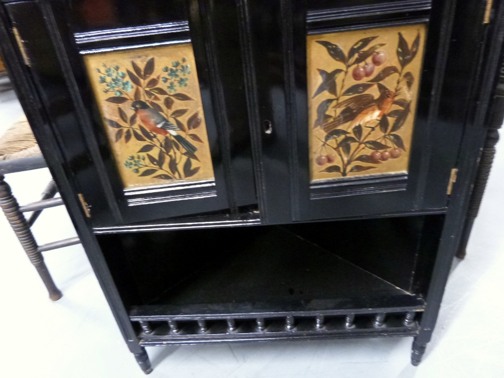 Ebonised corner cupboard in the manner of E. W. Godwin with gilt decorated panels depicting birds - Image 5 of 7