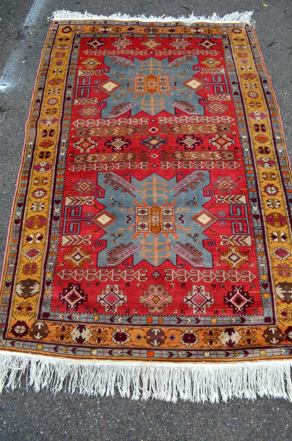 Persian red ground carpet, main yellow border the centre decorated with a pair of shaped blue - Image 5 of 5