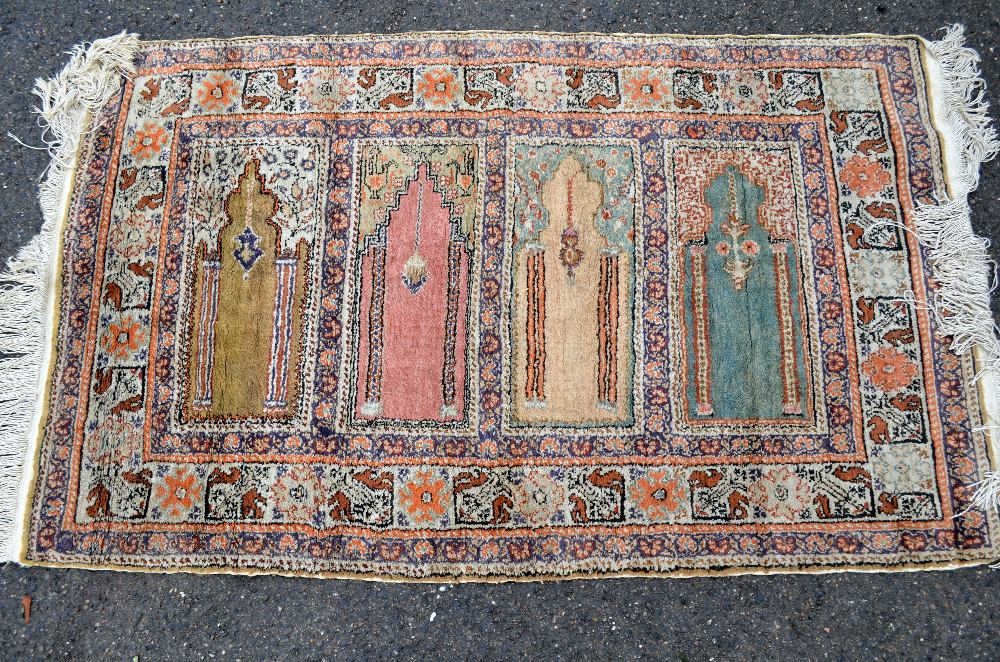 Persian Cream ground rug cream border centre with three medallions 62 x 36in. (157 x 91cm)Overall