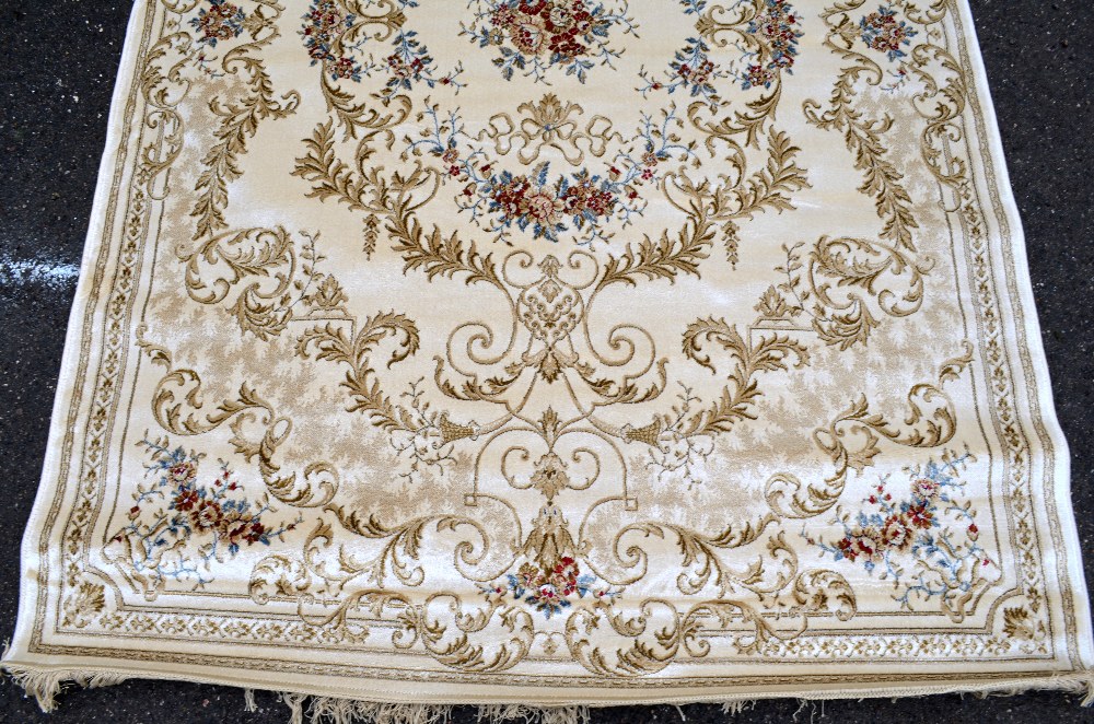 Ivory ground Kashmir rug with a classical floral design, 2.4m x 1.6m - Image 2 of 5