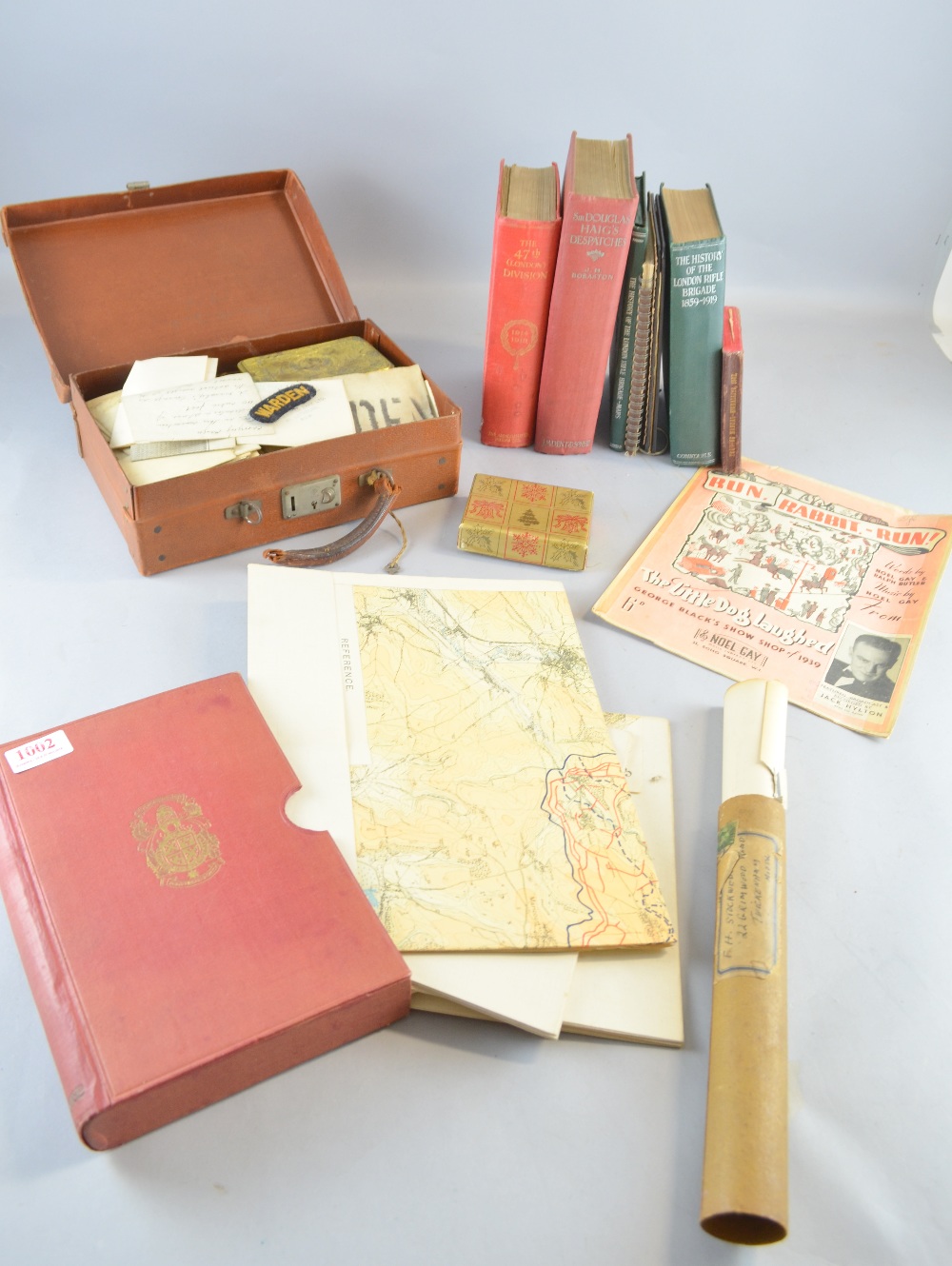 Collection of First World War military items including Queen Mary tin, photographs, hand written