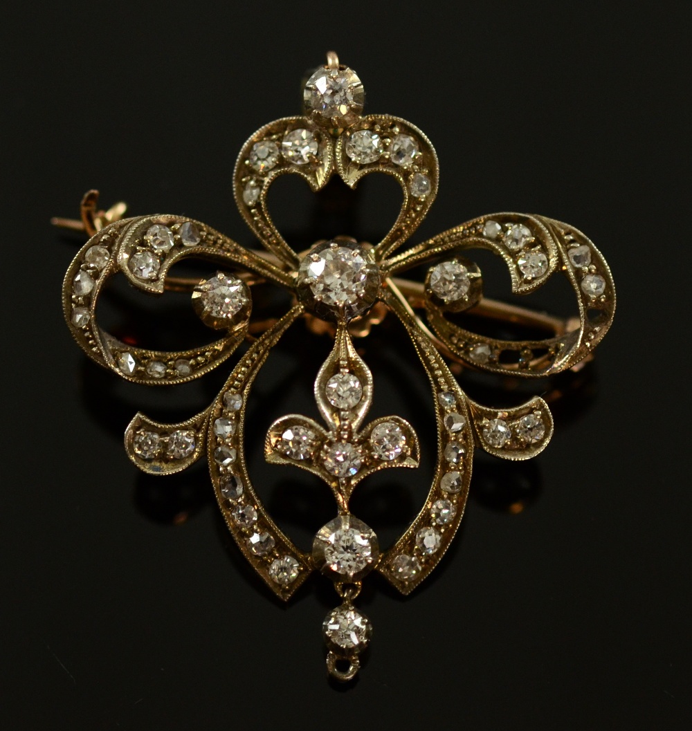 Edwardian openwork diamond pendant with detachable brooch