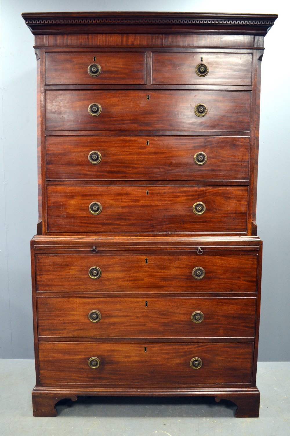 George III mahogany tallboy, of two short over three long graduated drawers above base with brushing