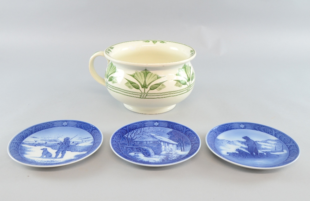 Three Royal Copenhagen Christmas plates and a Wedgwood pot