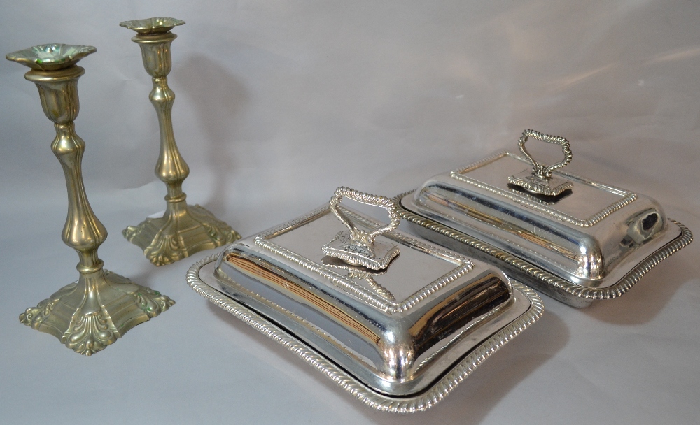 Pair of entree dishes, pair of candlesticks, and a set of steak knives and forks