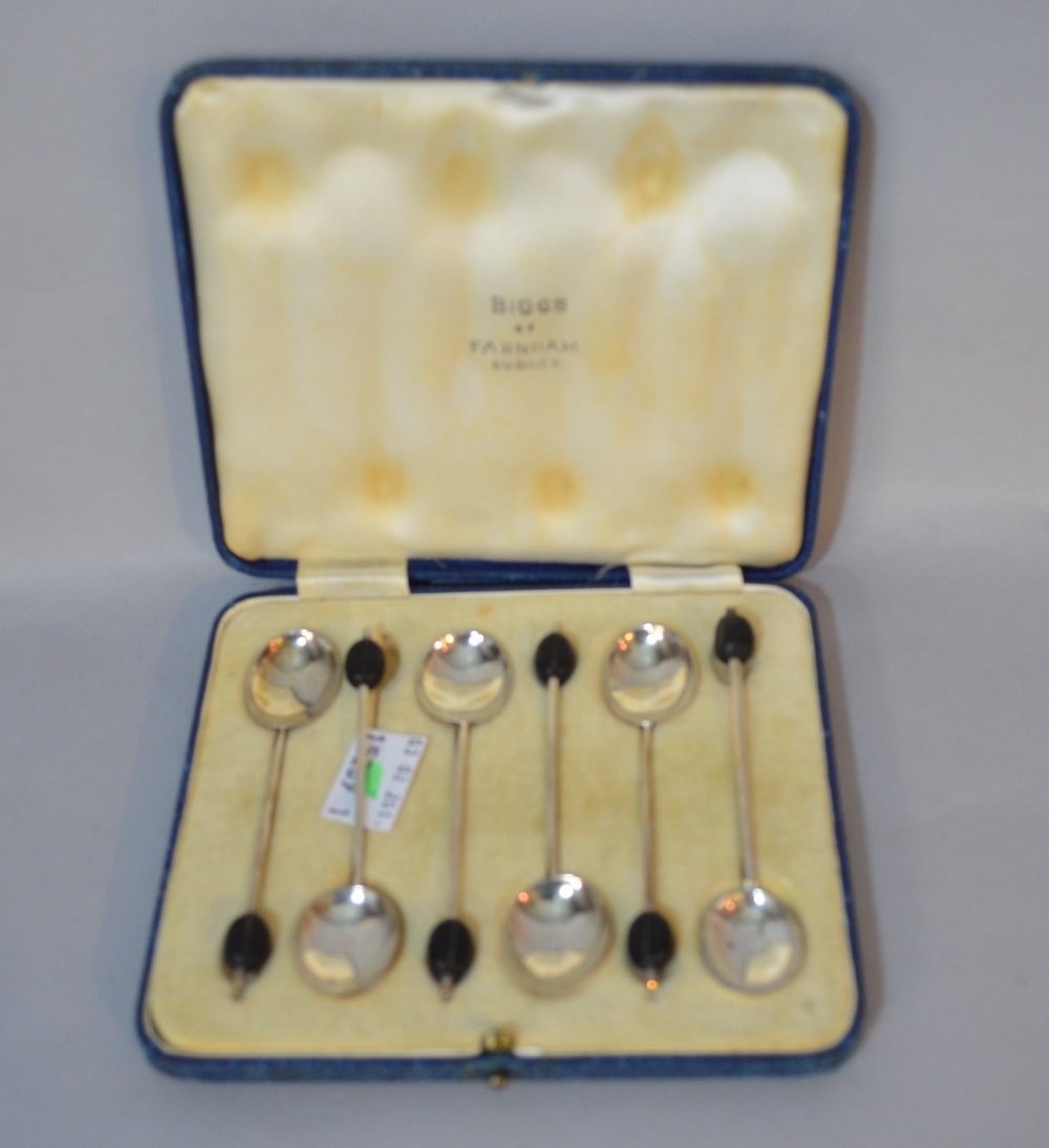 Set of six silver coffee spoons, boxed Proceeds from this lot will be donated to Guildford Cathedral