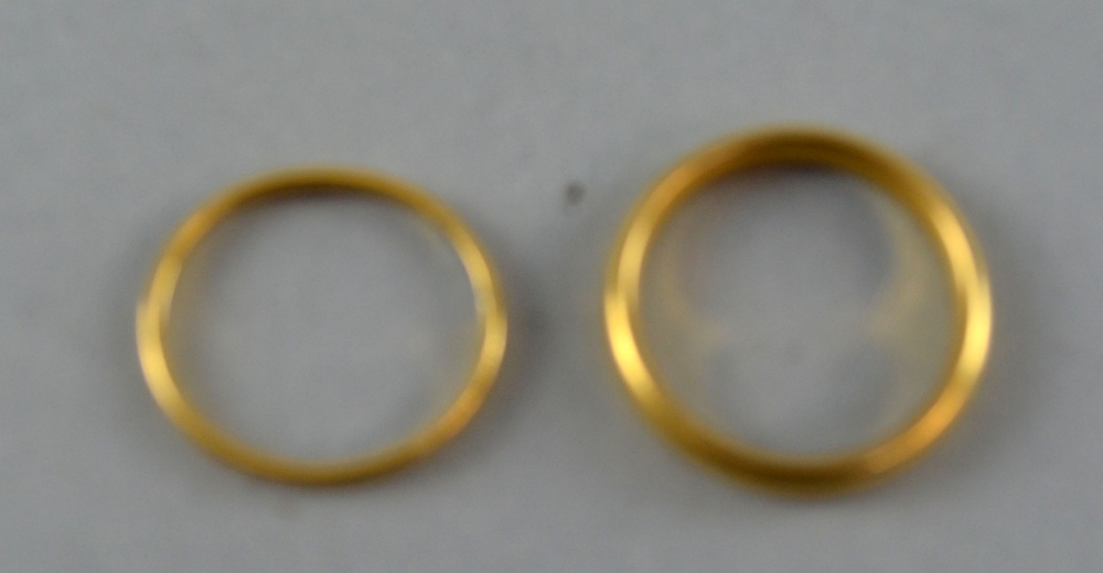 Two gold wedding bands 22ct