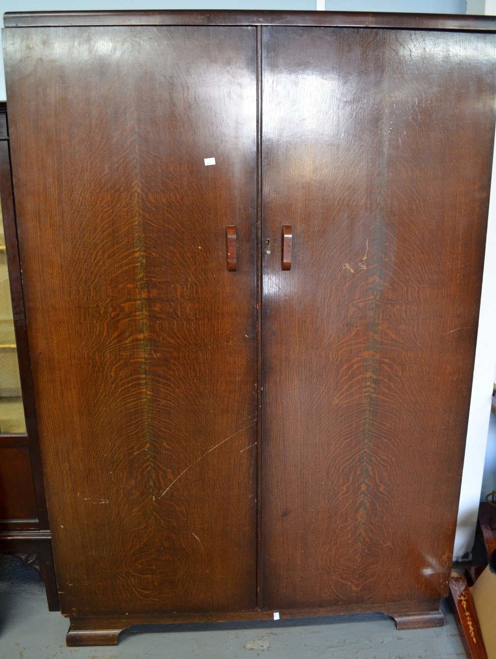 Oak two door wardrobe revealing fitted slides 72 x 48 x 20in. (183 x 122 x 51cm)
