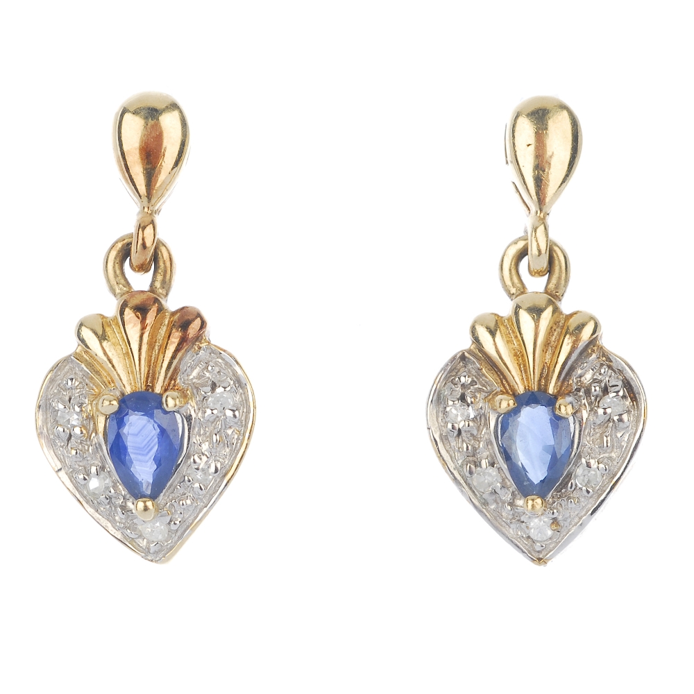 A set of 9ct gold sapphire and diamond jewellery and an emerald pendant. To include a pendant and