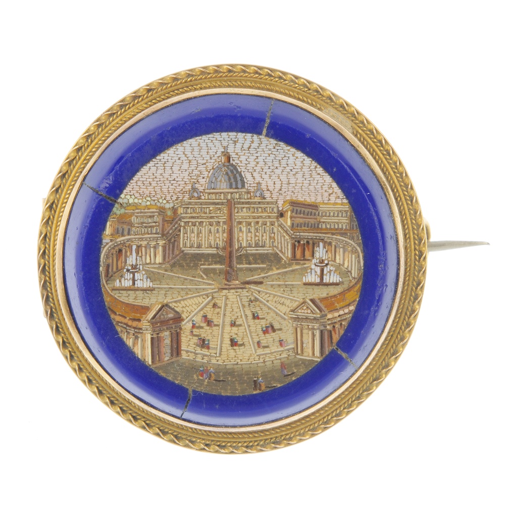 A late 19th century gold micro-mosaic brooch. The circular-shape mosaic depicting the Vatican,