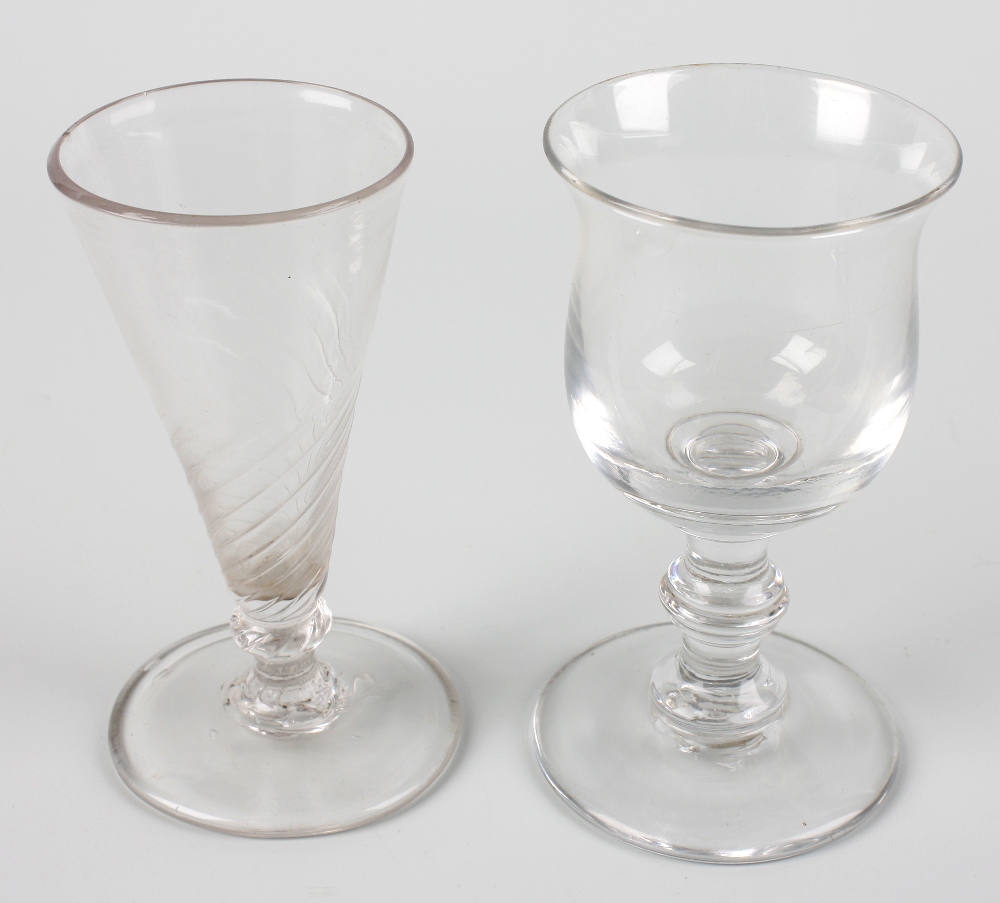 Two 18th century drinking glasses, the first of wrythen twist, tapering form, upon knopped and