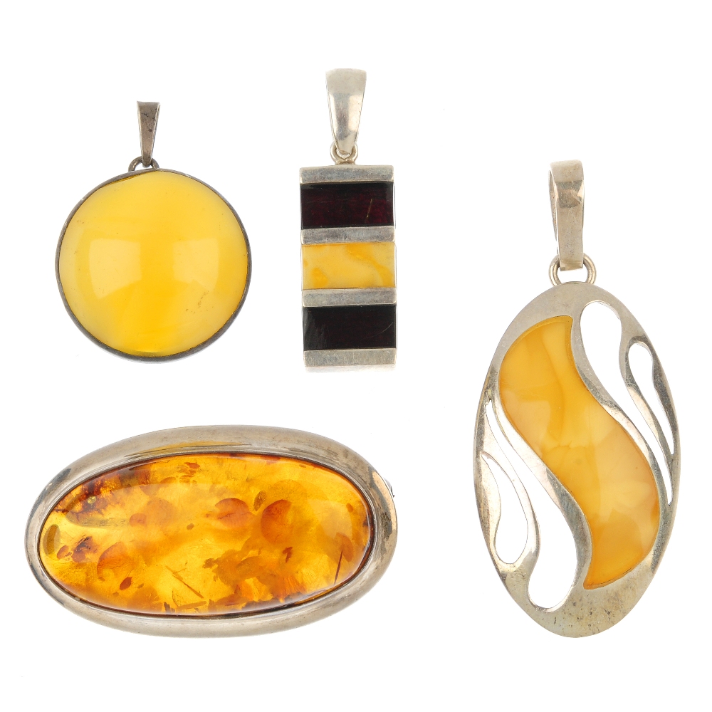 A selection of silver and white metal amber jewellery, to include a spherical bead and white metal