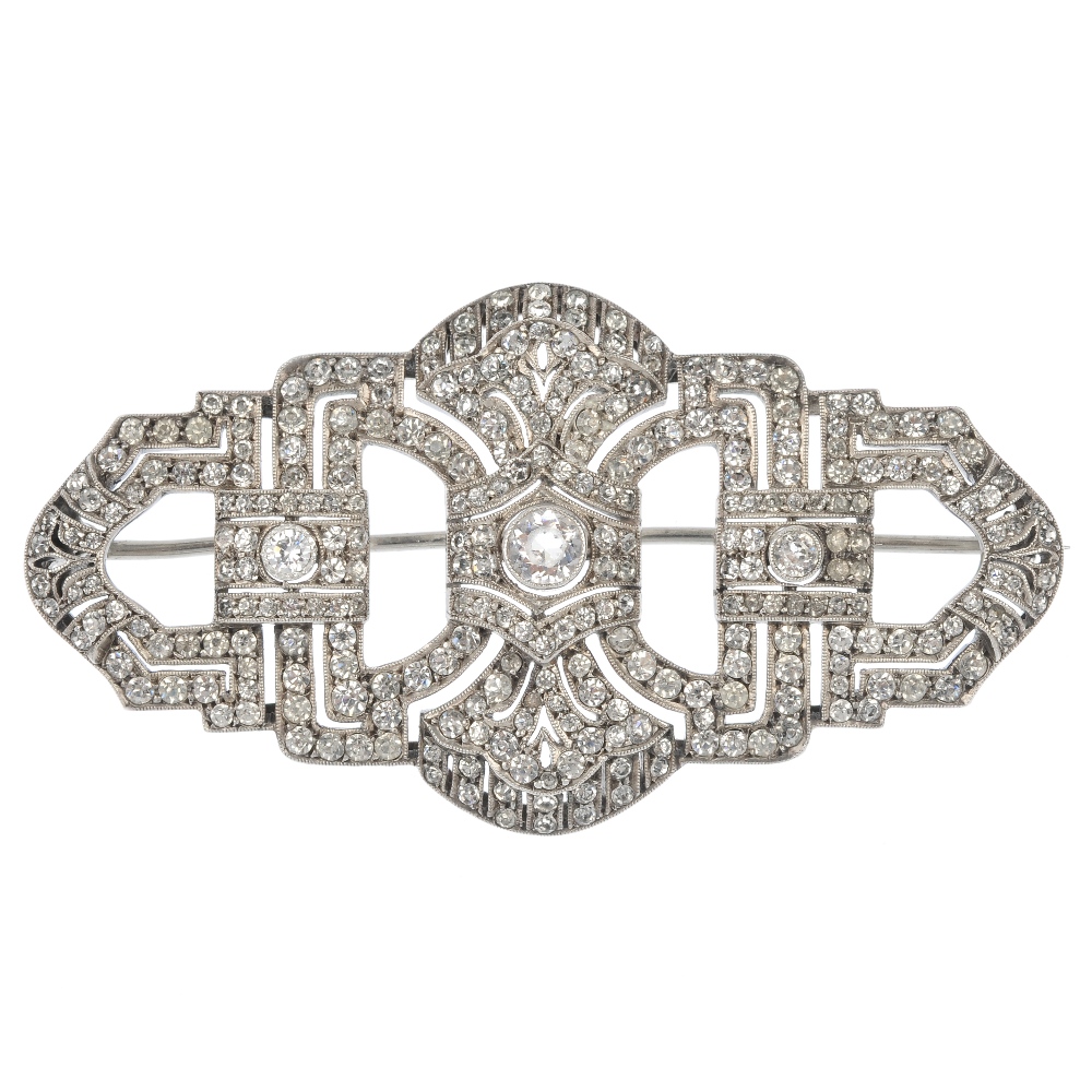 An early 20th century paste brooch, of openwork design, the circular-shape colourless paste