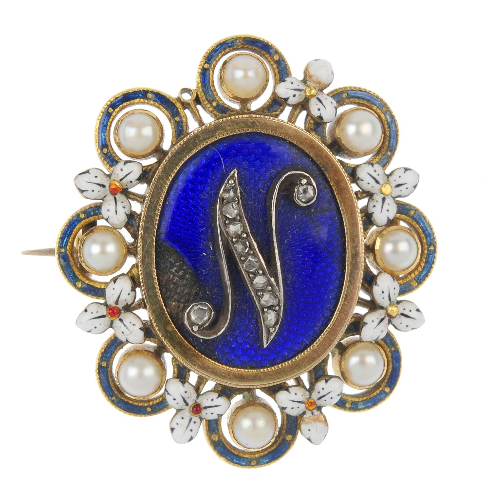 A late Victorian gold pearl and diamond commemorative brooch, circa 1890, the oval-shape blue