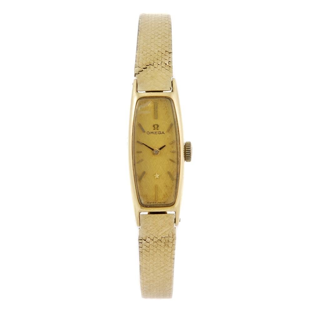 OMEGA - a lady`s bracelet watch. Stamped 18k with poincon. Numbered 511271. Signed manual wind