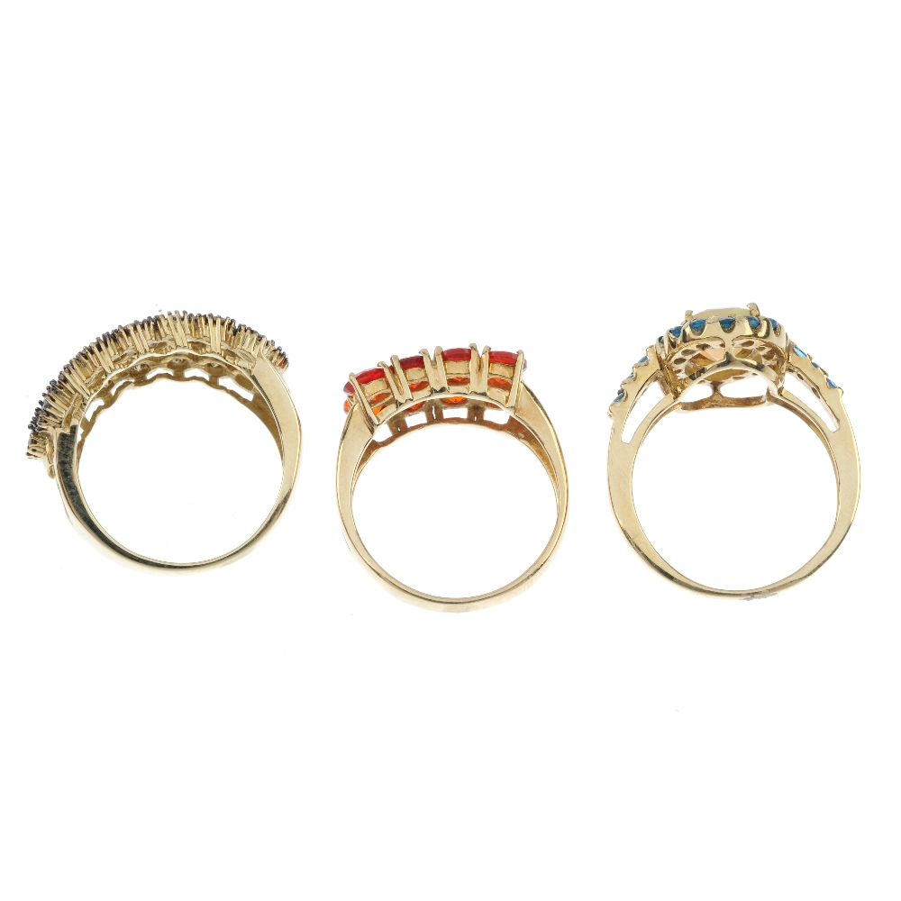 A selection of three 9ct gold gem-set dress rings. To include a `brown` diamond ring with heart - Image 4 of 4