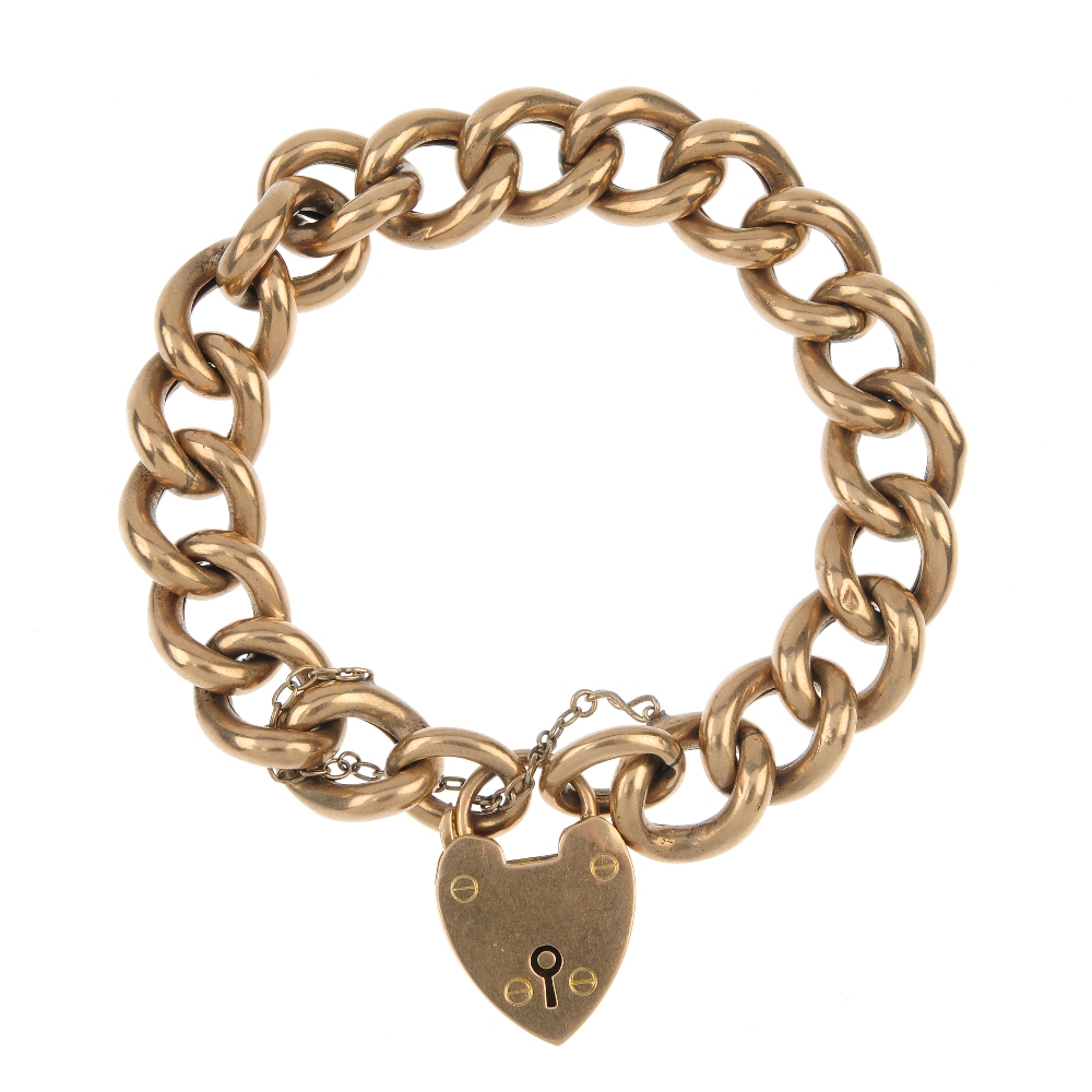 An Edwardian 9ct gold bracelet. The curb-link chain, to the padlock clasp. Hallmarks for