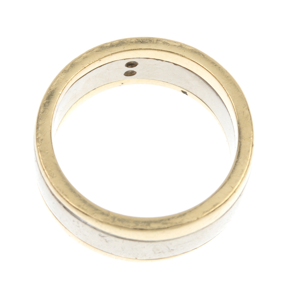 An 18ct gold diamond band ring. The square-shape diamond double accent, inset to the bi-colour - Image 3 of 3