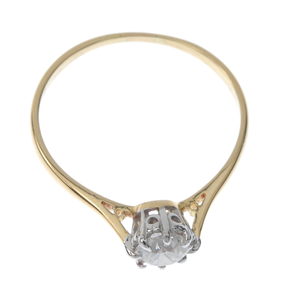 A diamond single-stone ring. The brilliant-cut diamond, weighing 0.70ct, to the tapered shoulders - Image 2 of 5