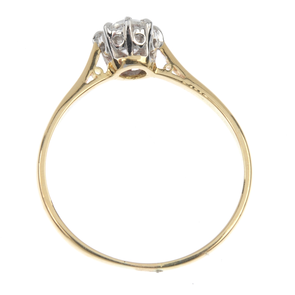 A diamond single-stone ring. The brilliant-cut diamond, weighing 0.70ct, to the tapered shoulders - Image 4 of 5