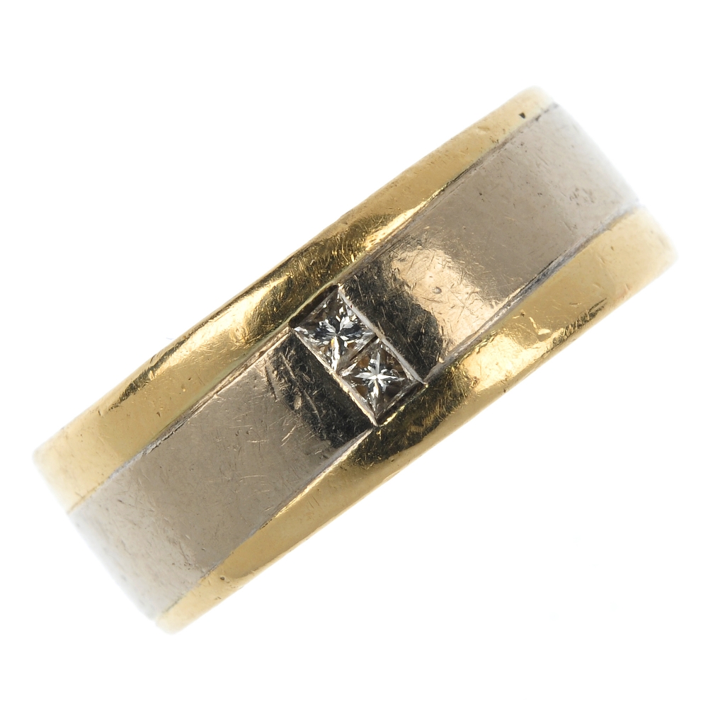 An 18ct gold diamond band ring. The square-shape diamond double accent, inset to the bi-colour