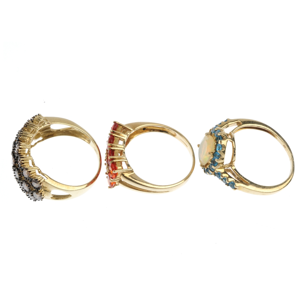 A selection of three 9ct gold gem-set dress rings. To include a `brown` diamond ring with heart - Image 3 of 4