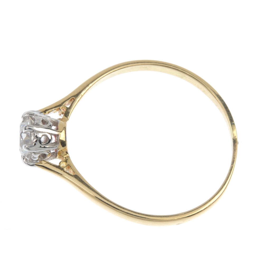 A diamond single-stone ring. The brilliant-cut diamond, weighing 0.70ct, to the tapered shoulders - Image 3 of 5