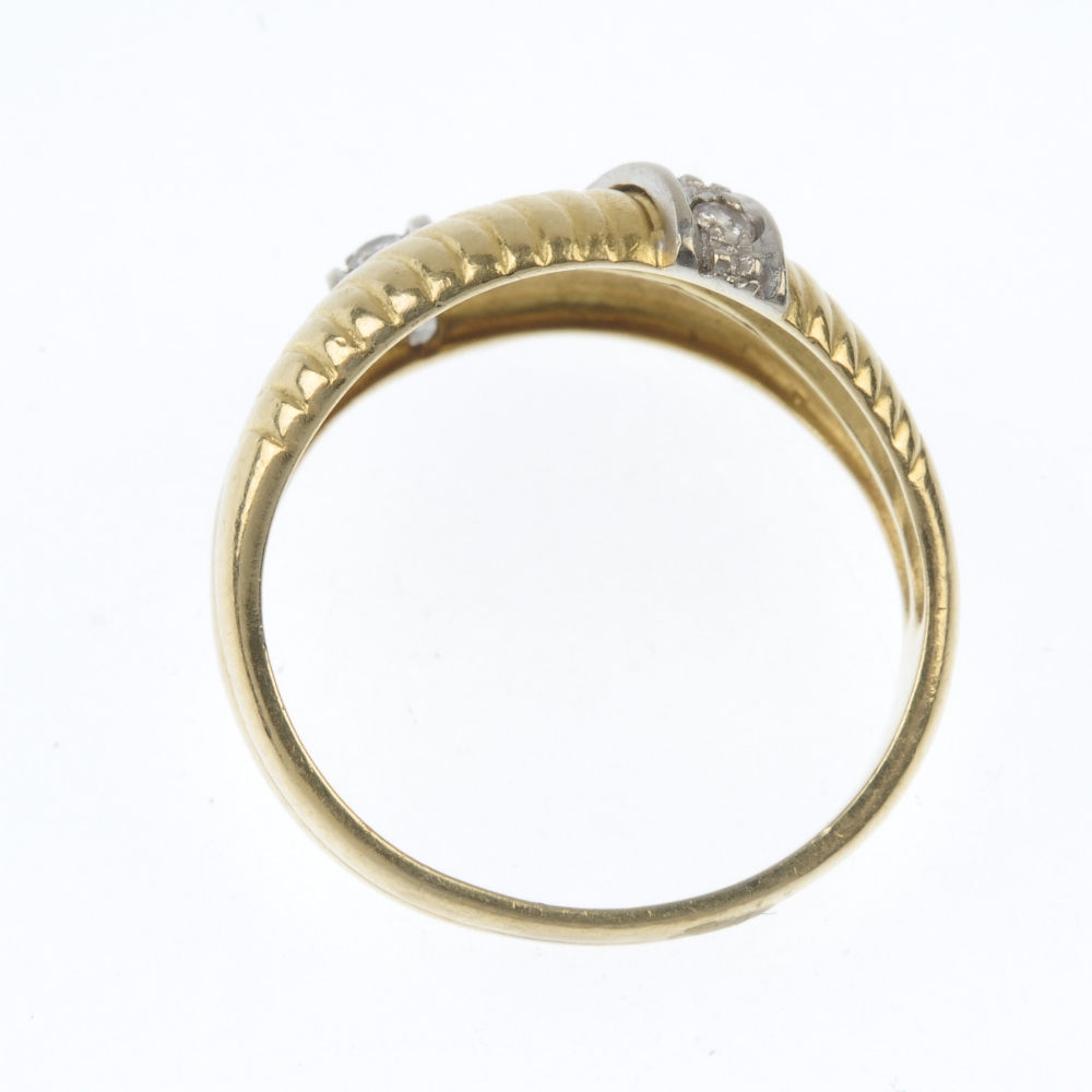 A diamond dress ring. Comprising two grooved panels, with brilliant-cut diamond line accents, to - Image 4 of 4