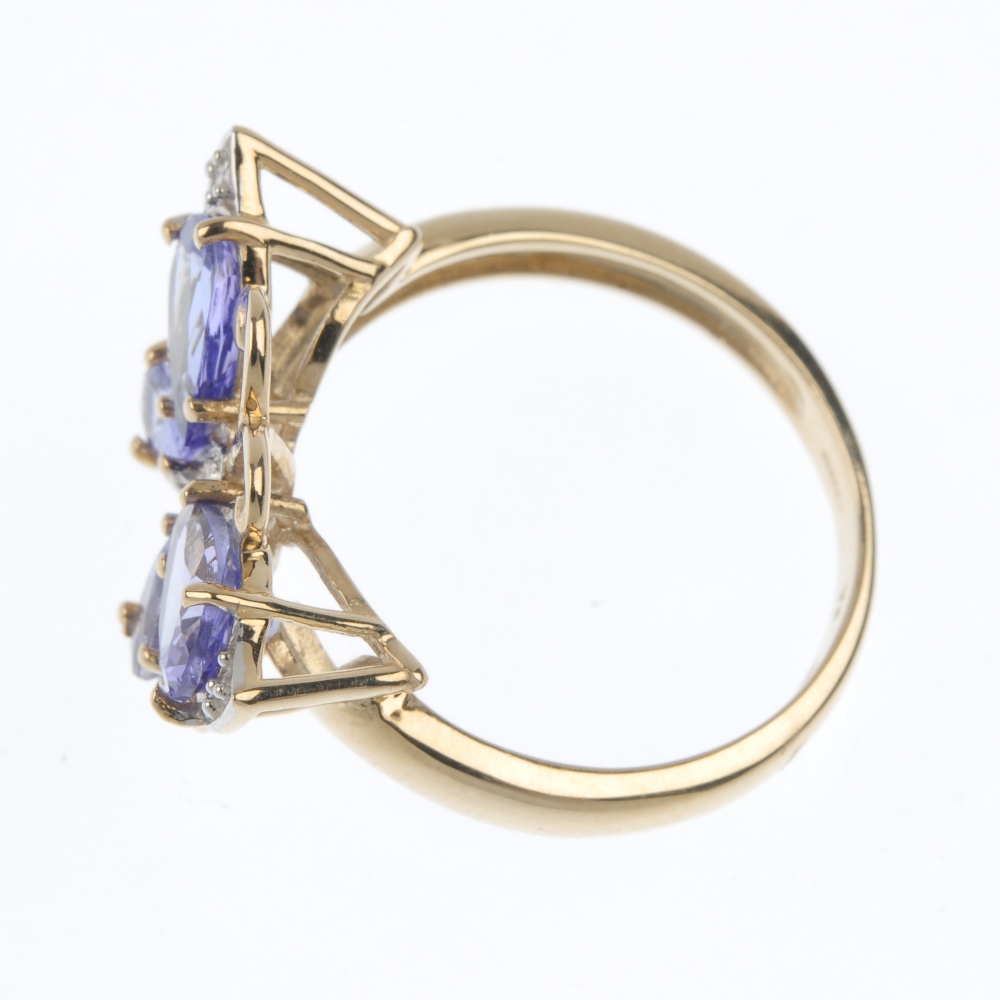 A 9ct gold diamond and tanzanite butterfly ring. The pear-shape tanzanite wings, with brilliant-cut - Image 3 of 4