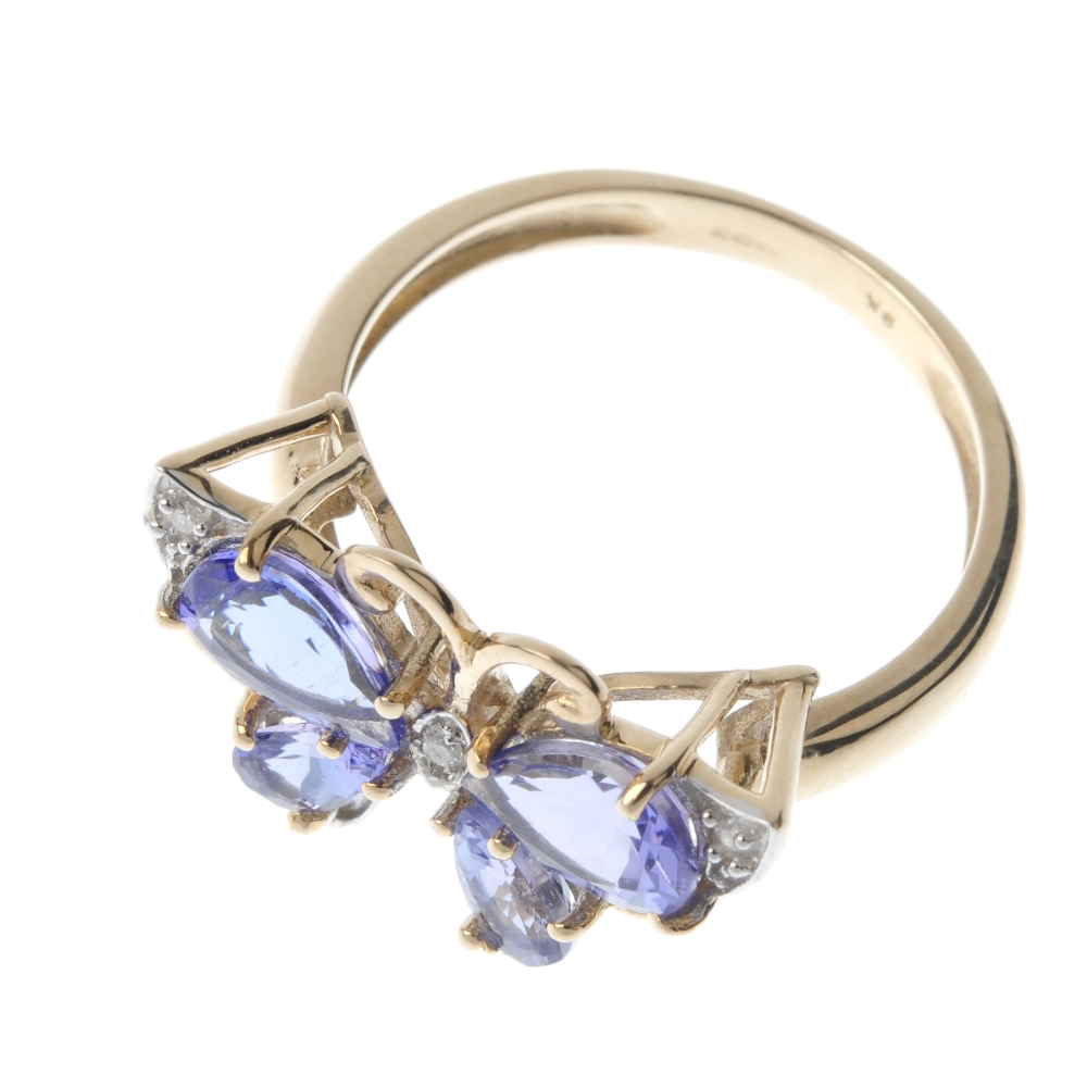 A 9ct gold diamond and tanzanite butterfly ring. The pear-shape tanzanite wings, with brilliant-cut - Image 2 of 4