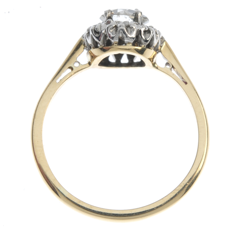 A diamond cluster ring. The old-cut diamond, within a single-cut diamond illusion surround, to the - Image 4 of 4