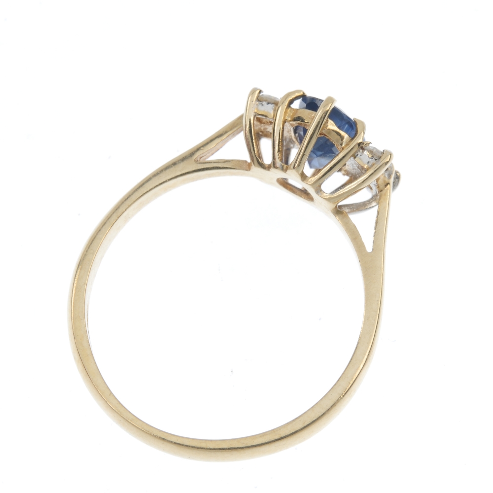 A 9ct gold sapphire and diamond ring. The oval-shape sapphire, with brilliant-cut diamond double - Image 4 of 4