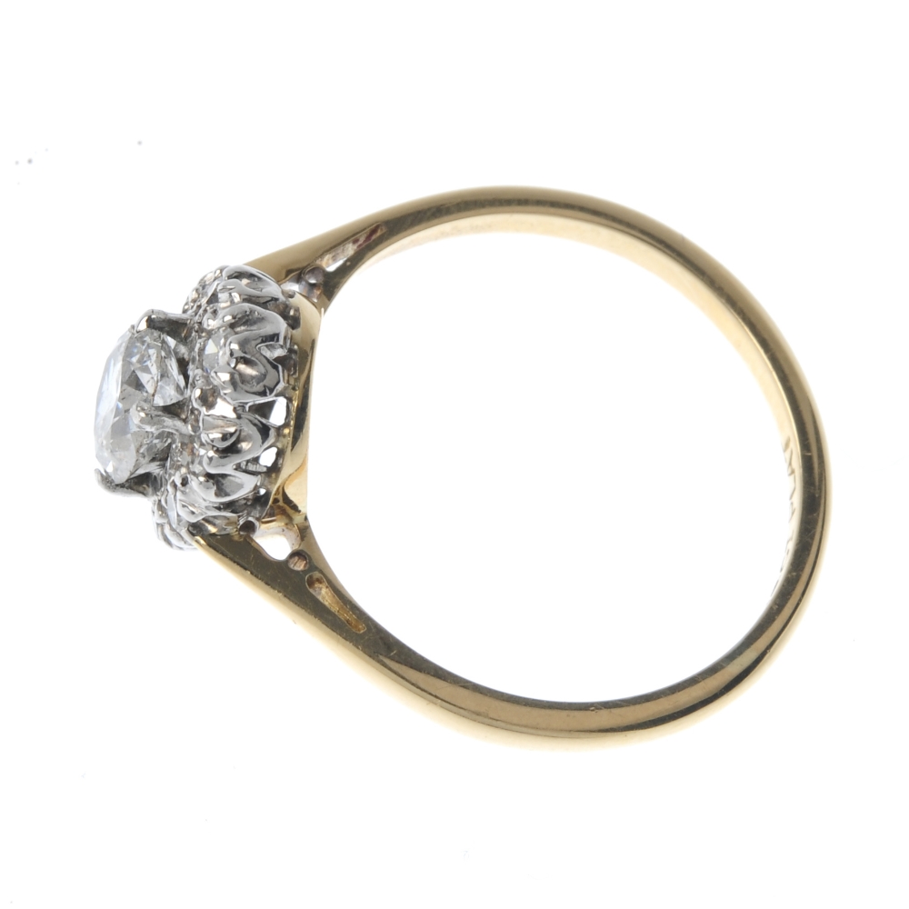 A diamond cluster ring. The old-cut diamond, within a single-cut diamond illusion surround, to the - Image 3 of 4