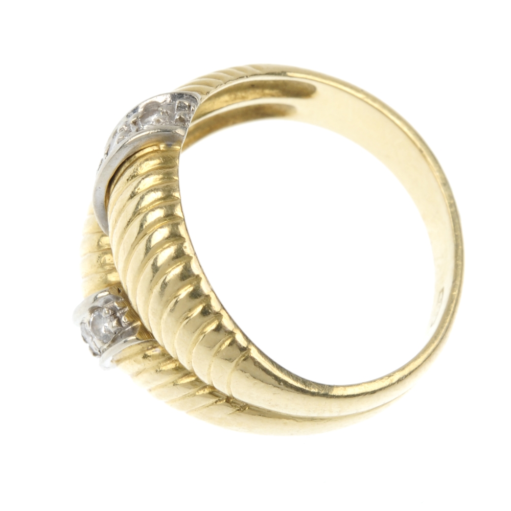 A diamond dress ring. Comprising two grooved panels, with brilliant-cut diamond line accents, to - Image 3 of 4