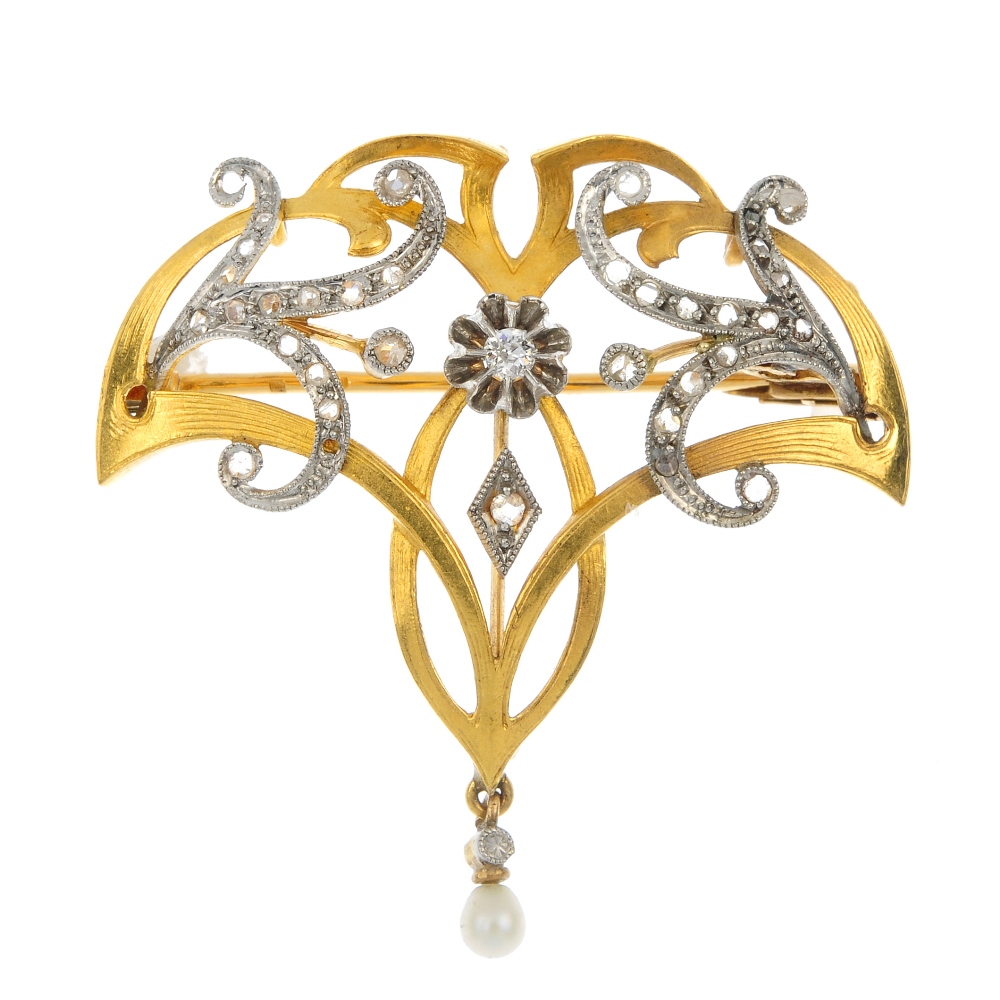 An early 20th century 18ct gold diamond and seed pearl brooch. Of openwork design, the old-cut