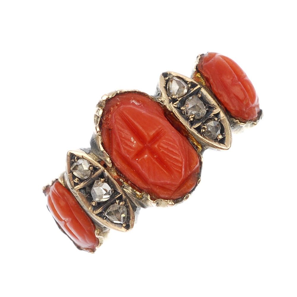 A late 19th century gold coral and diamond ring. Designed as three graduated oval-shape carved coral