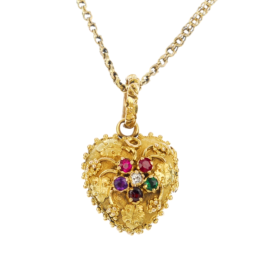 A mid 19th century gold gem-set `Regard` locket. Of heart-shape outline, the replacement ruby,