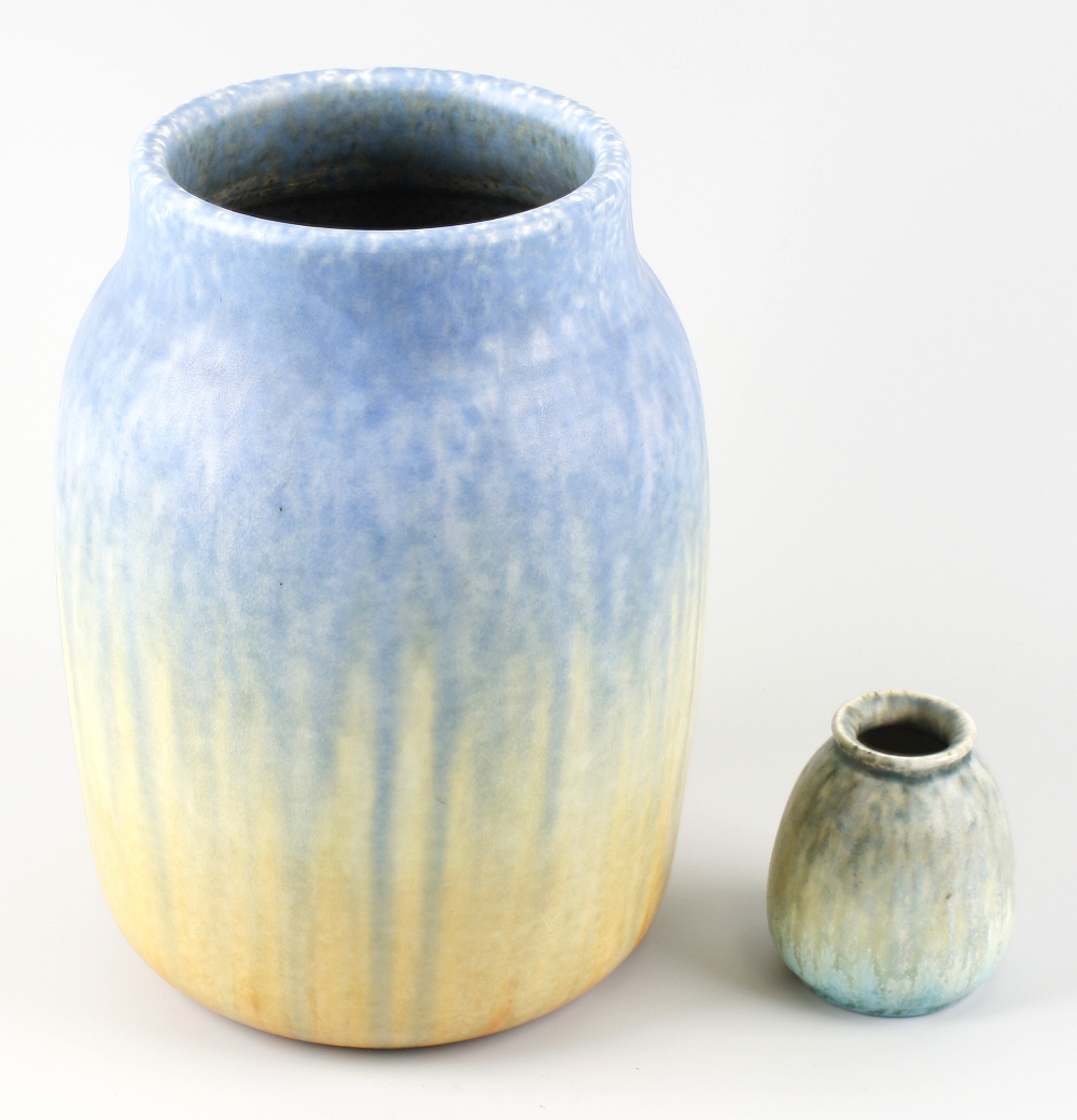 A 1932 Ruskin Pottery vase of ovoid form decorated in merging blue, yellow and orange matt glazed