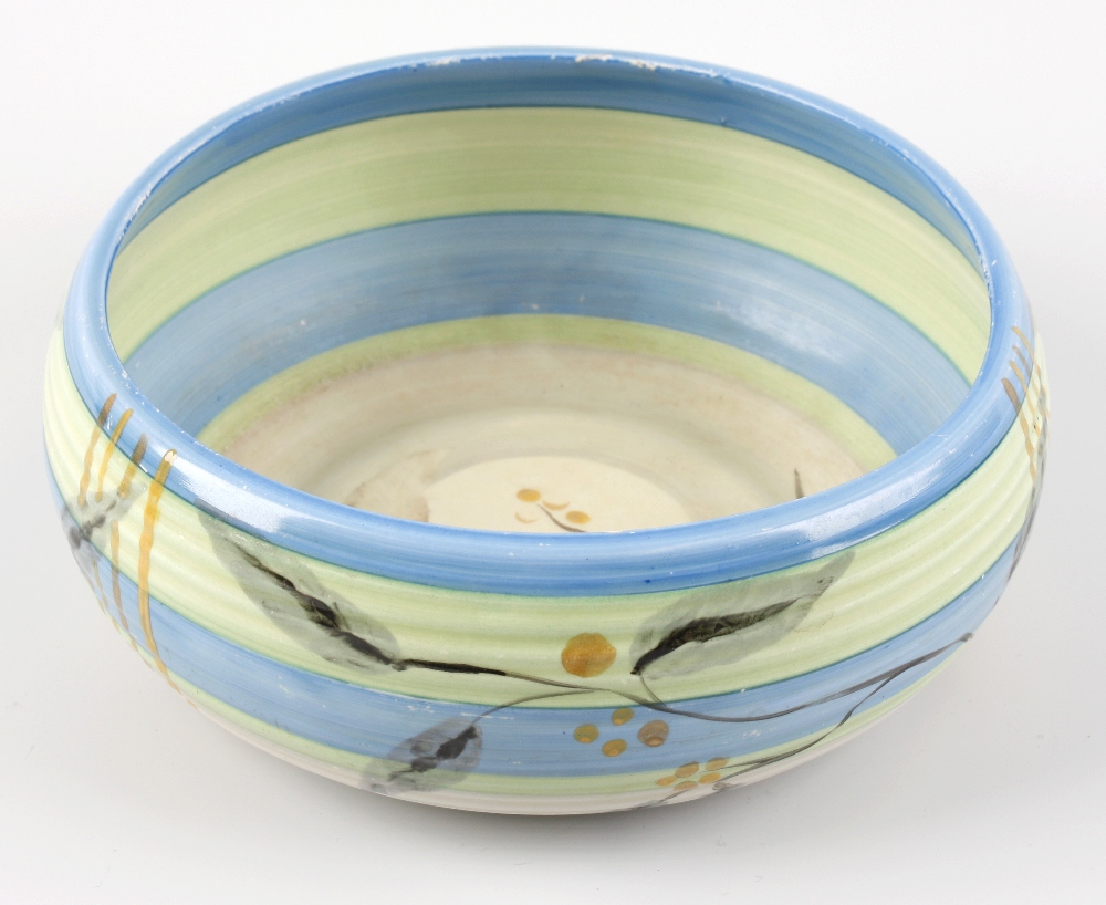 A Clarice Cliff Wilkinsons pottery Bizarre bowl, hand painted in the `Blue Kelverne` pattern,