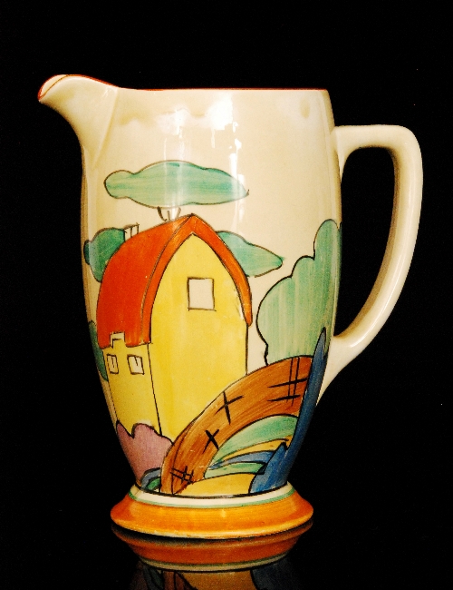 Clarice Cliff - Orange Roof Cottage - A large Coronet shape jug circa 1932 hand painted with a