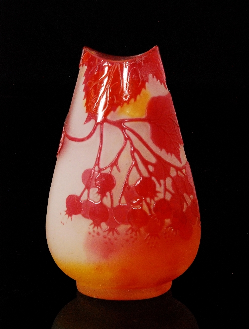 Galle - An early 20th Century French cameo glass vase of compressed tear form with scalloped neck,