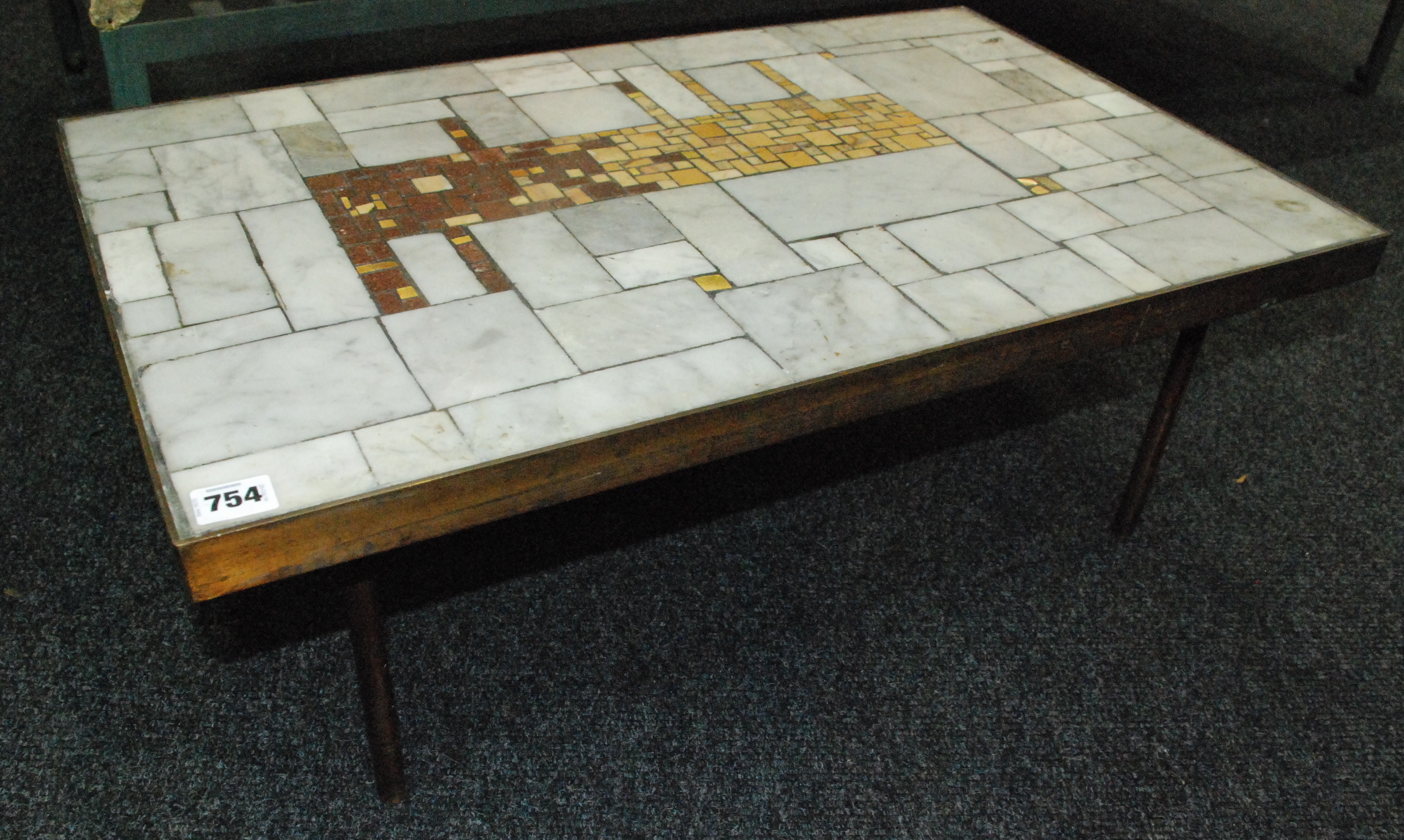 Berthold Muller (German) - A marble and onyx mosaic occasional table of rectangular form with brass