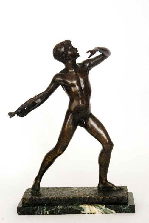 Arturo Carrera - A 1930s bronze figural sculpture of a naked boy in wide legged stance about to