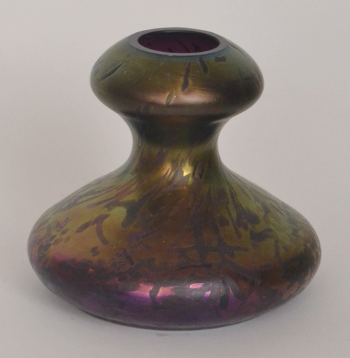 Kralik - An early 20th Century vase of compressed double gourd form with a purple to gold mottled