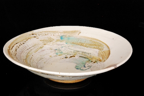Unknown - A large contemporary studio pottery bowl decorated in a thick milk white slip with wash