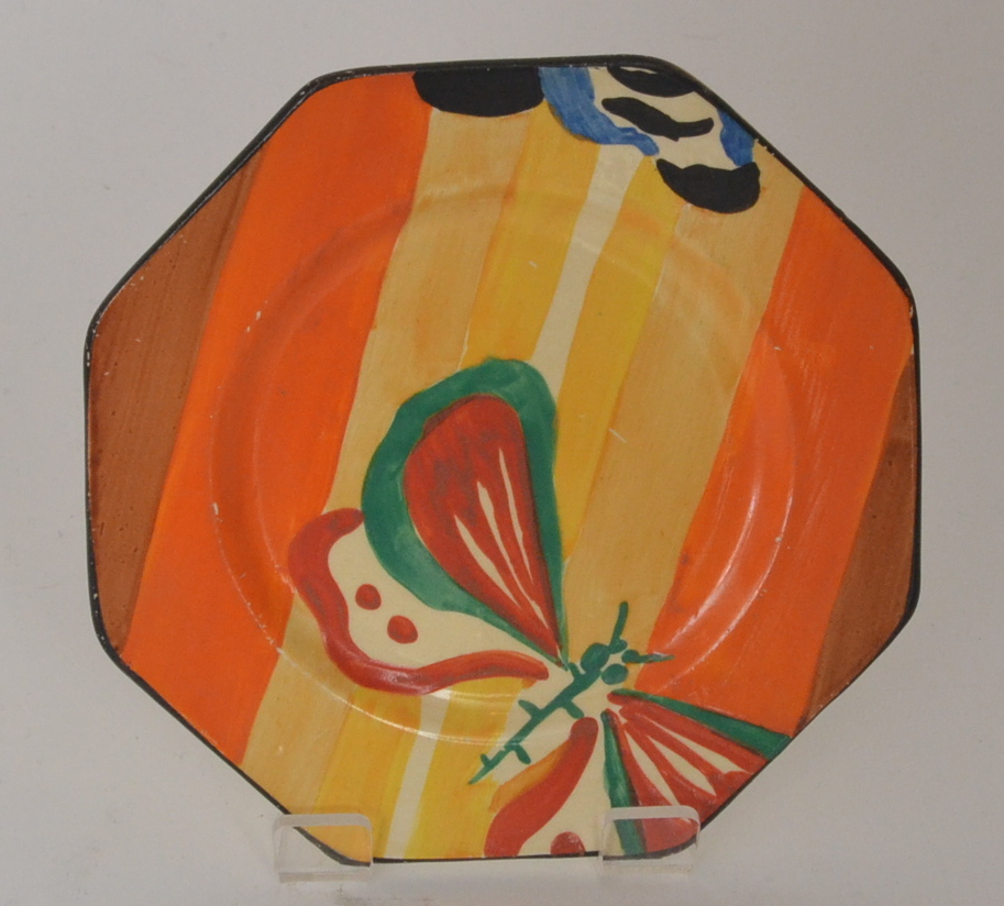 Clarice Cliff - Butterfly - An octagonal side plate circa 1930 hand painted with a stylised